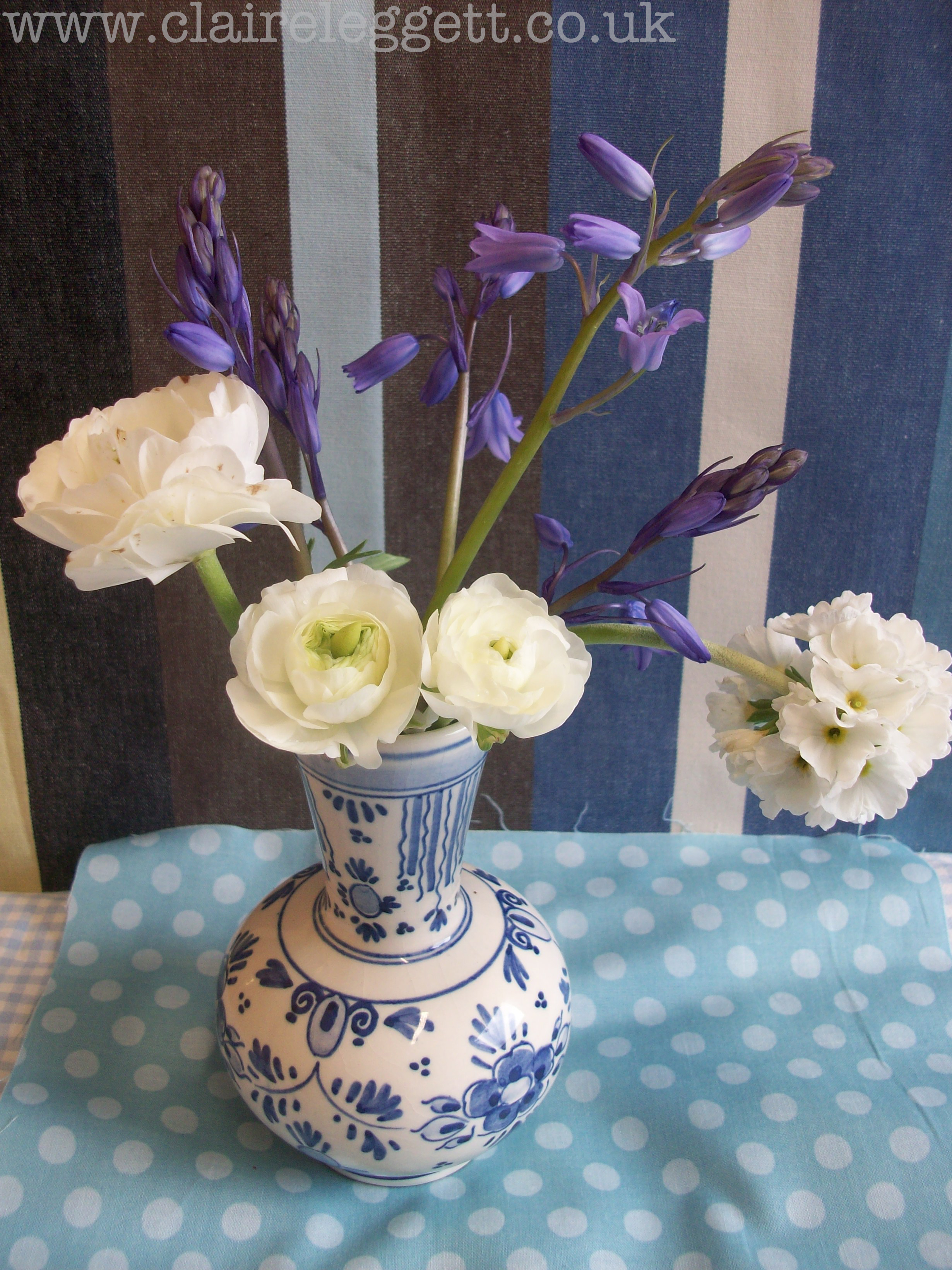 Claire_leggett_Ranunculus and Bluebells_set up